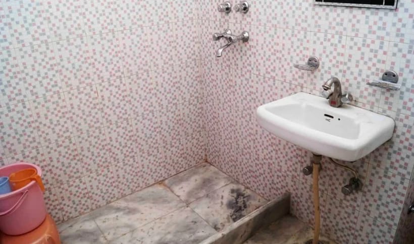Attached bathroom with sink